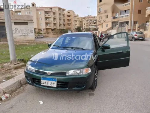 ميتسوبيشي لانسر 1998 أخضر مستعملة للبيع - 1