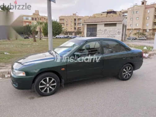 ميتسوبيشي لانسر 1998 أخضر مستعملة للبيع - 2
