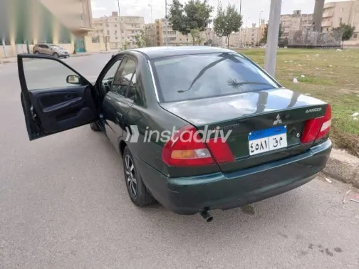 ميتسوبيشي لانسر 1998 أخضر مستعملة للبيع - 4