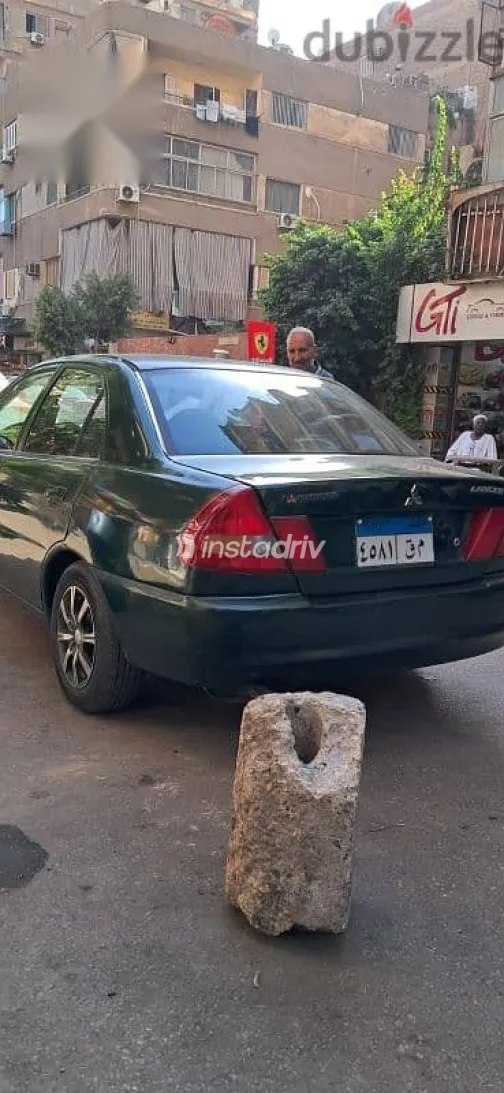ميتسوبيشي لانسر 1998 أخضر مستعملة للبيع - 6