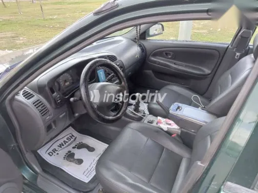 ميتسوبيشي لانسر 1998 أخضر مستعملة للبيع - 7