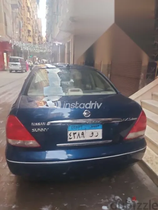 نيسان صنى 2009 أزرق غامق مستعملة للبيع - 4