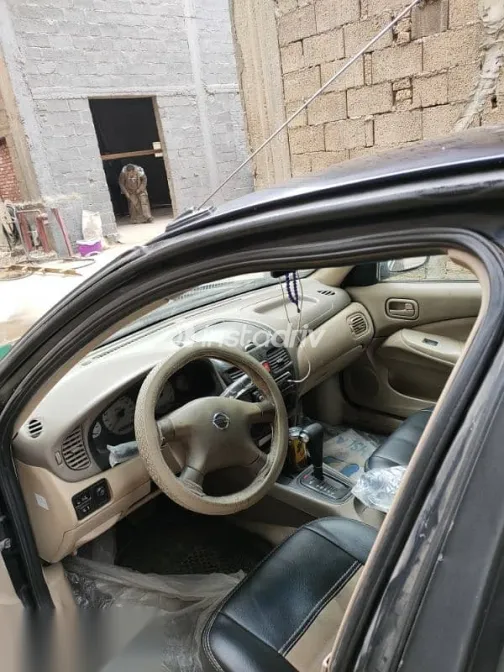 نيسان صنى 2009 أزرق غامق مستعملة للبيع - 7