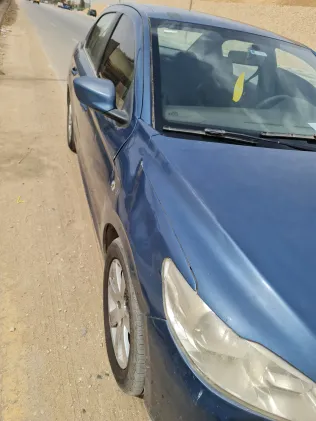 بيجو 301 2014 أبيض مستعملة للبيع