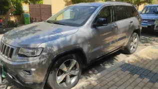 جيب جراند شيروكي 2014 أبيض مستعملة للبيع