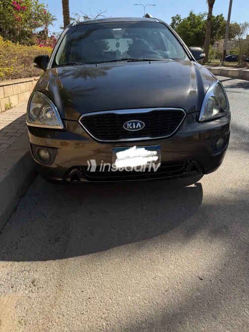 كيا كارينز 2013 أبيض مستعملة للبيع - 2