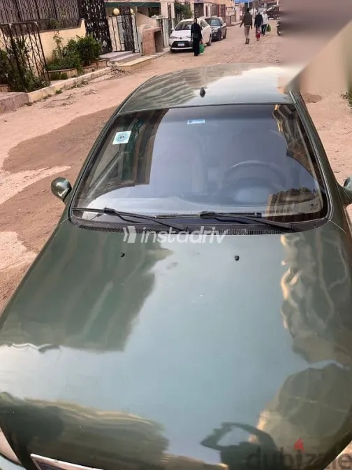 كيا ريو 2001 أخضر مستعملة للبيع - 2