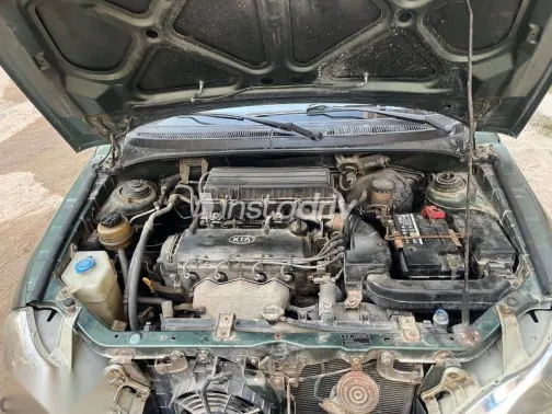 كيا ريو 2001 أخضر مستعملة للبيع - 7