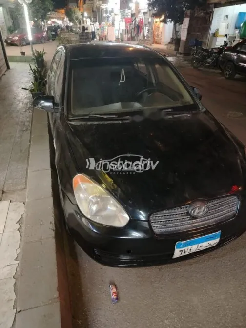 هيونداي اكسنت 2009 أسود مستعملة للبيع - 4