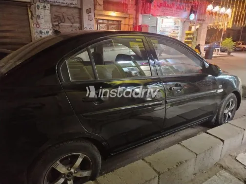 هيونداي اكسنت 2009 أسود مستعملة للبيع - 6