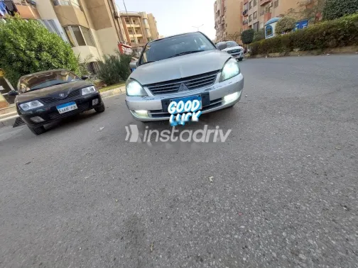 ميتسوبيشي لانسر 2007 ذهبي مستعملة للبيع - 1