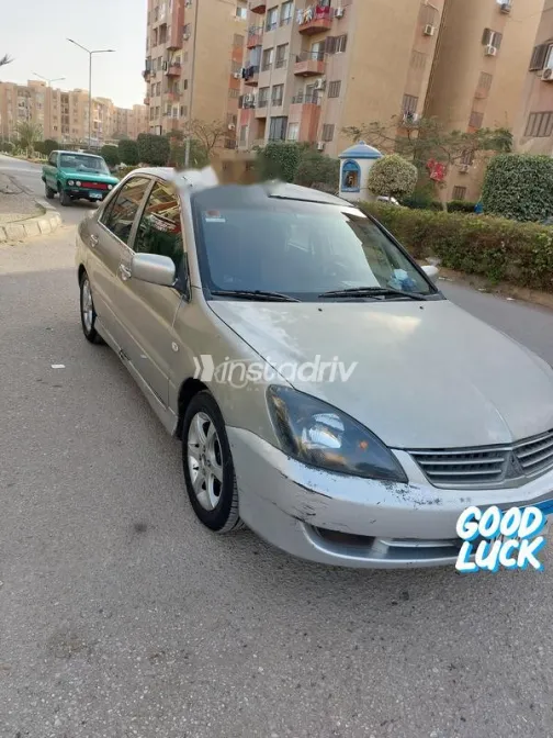 ميتسوبيشي لانسر 2007 ذهبي مستعملة للبيع - 2