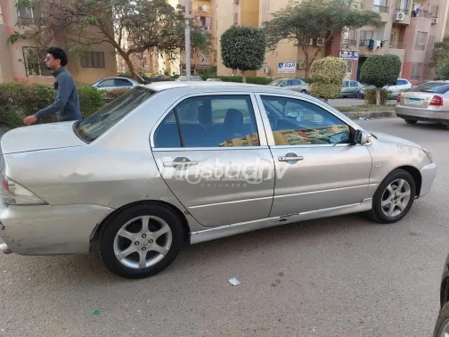 ميتسوبيشي لانسر 2007 ذهبي مستعملة للبيع - 4