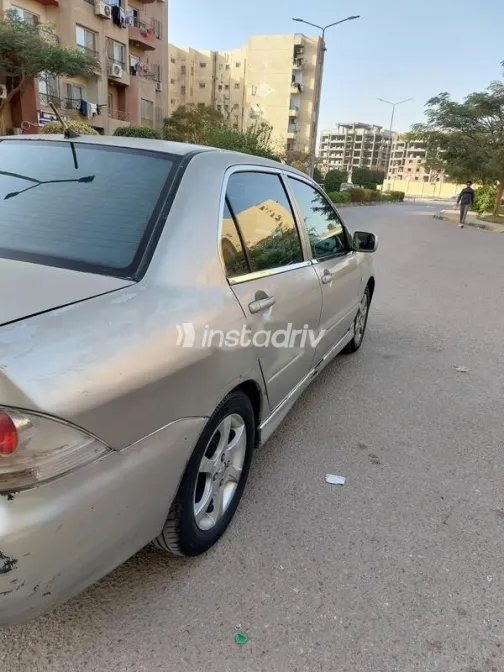 ميتسوبيشي لانسر 2007 ذهبي مستعملة للبيع - 5