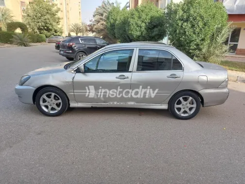 ميتسوبيشي لانسر 2007 ذهبي مستعملة للبيع - 7