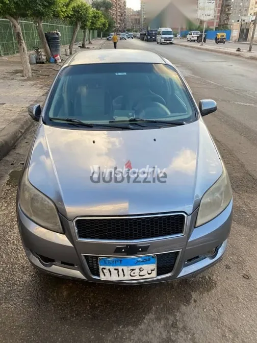 شيفروليه افيو 2014 فضي مستعملة للبيع - 4