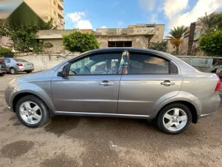 شيفروليه افيو 2014 فضي مستعملة للبيع