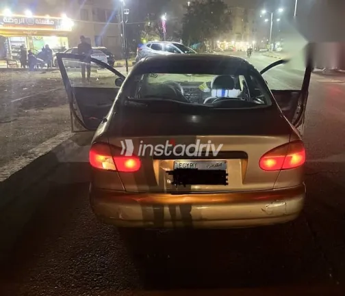 دايو لانوس 1999 ذهبي مستعملة للبيع - 1