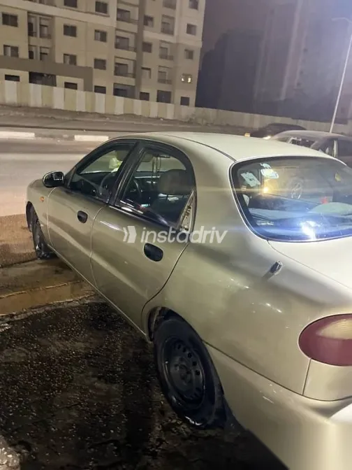 دايو لانوس 1999 ذهبي مستعملة للبيع - 4