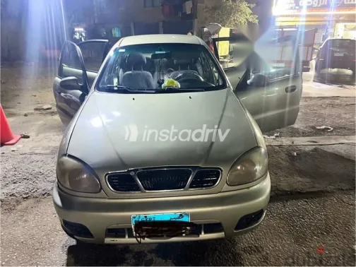 دايو لانوس 1999 ذهبي مستعملة للبيع - 6