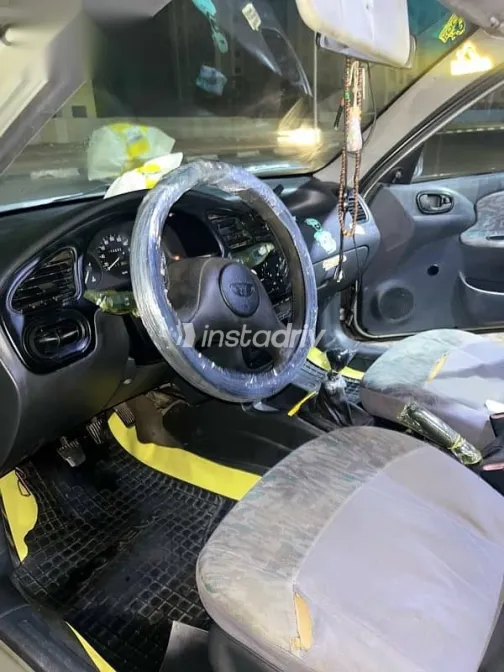 دايو لانوس 1999 ذهبي مستعملة للبيع - 8