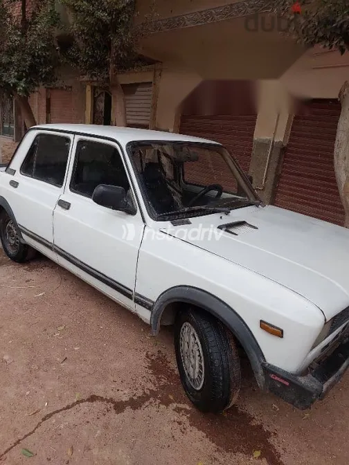 فيات 128 2006 أبيض مستعملة للبيع - 1
