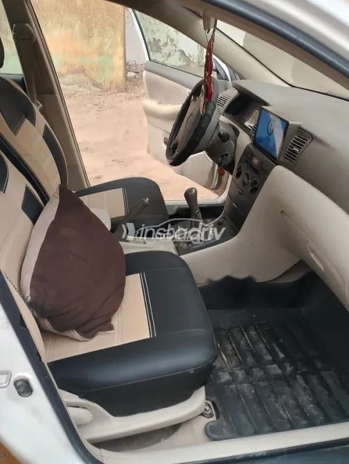 تويوتا كورولا 2003 أبيض مستعملة للبيع - 2