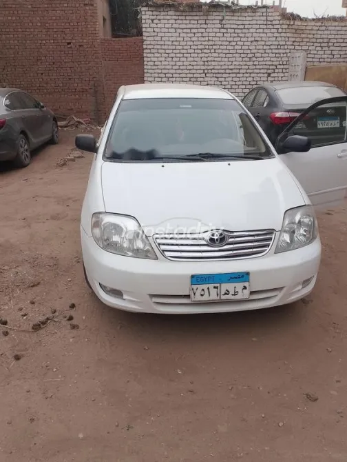 تويوتا كورولا 2003 أبيض مستعملة للبيع - 3