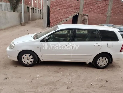 تويوتا كورولا 2003 أبيض مستعملة للبيع - 7