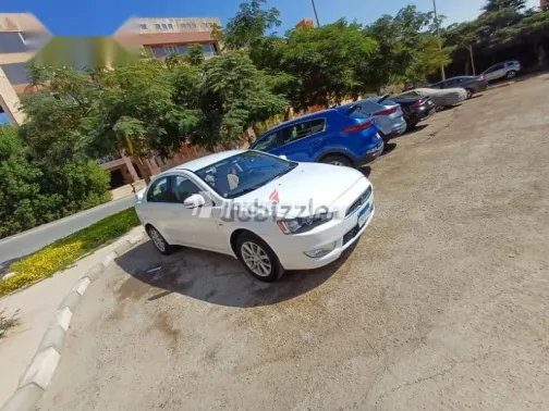 ميتسوبيشي لانسر 2015 أبيض مستعملة للبيع - 3