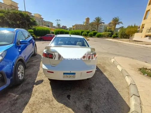 ميتسوبيشي لانسر 2015 أبيض مستعملة للبيع - 5