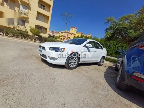 ميتسوبيشي لانسر 2015 أبيض مستعملة للبيع - 6