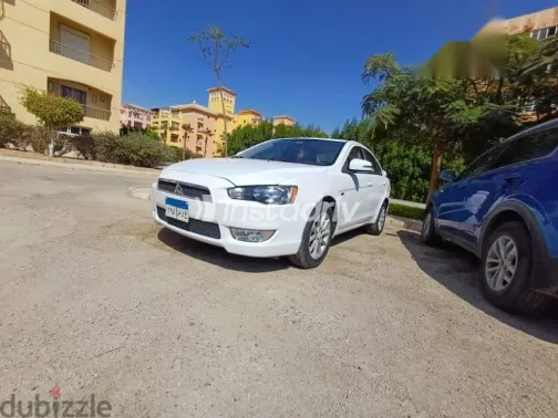 ميتسوبيشي لانسر 2015 أبيض مستعملة للبيع - 8