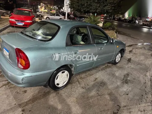 دايو لانوس 2004 فضي مستعملة للبيع - 1