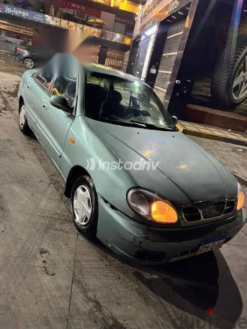 دايو لانوس 2004 فضي مستعملة للبيع - 2