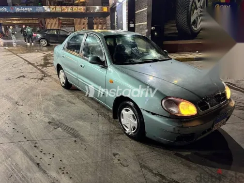 دايو لانوس 2004 فضي مستعملة للبيع - 8