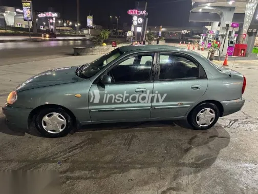 دايو لانوس 2004 فضي مستعملة للبيع - 9