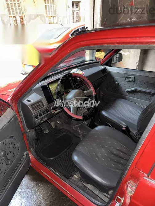 سوزوكى ماروتى 2011 أحمر مستعملة للبيع - 7