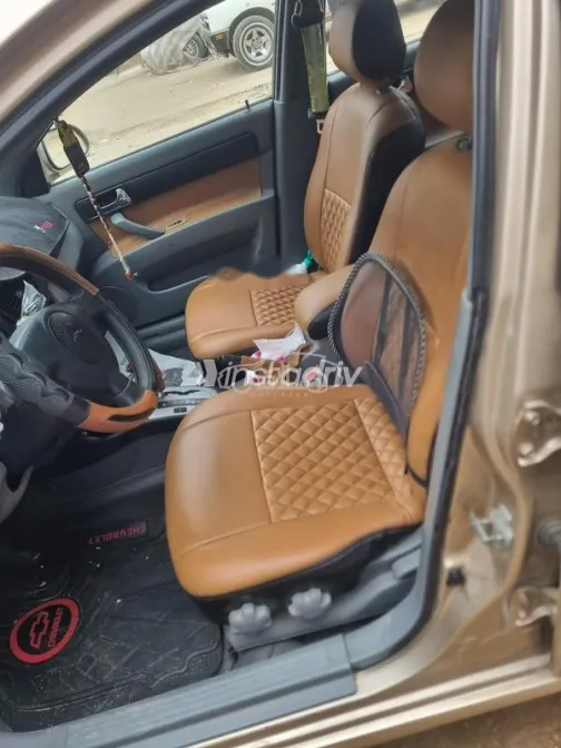 شيفروليه أوبترا 2005 ذهبي مستعملة للبيع - 5