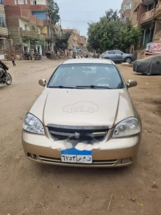 شيفروليه أوبترا 2005 ذهبي مستعملة للبيع