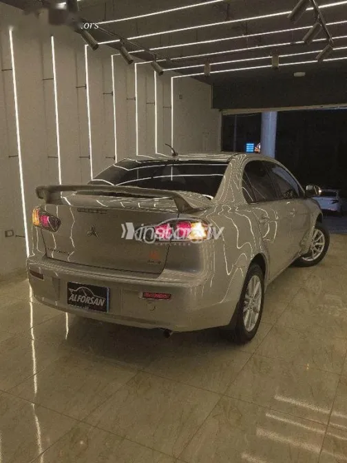 ميتسوبيشي لانسر 2018 ذهبي مستعملة للبيع - 6