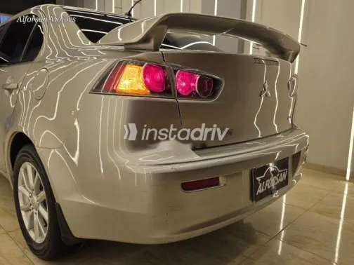 ميتسوبيشي لانسر 2018 ذهبي مستعملة للبيع - 7