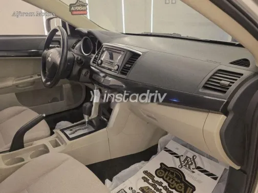 ميتسوبيشي لانسر 2018 ذهبي مستعملة للبيع - 8