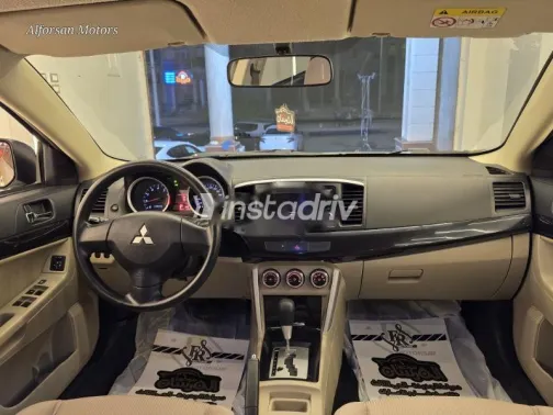 ميتسوبيشي لانسر 2018 ذهبي مستعملة للبيع - 9
