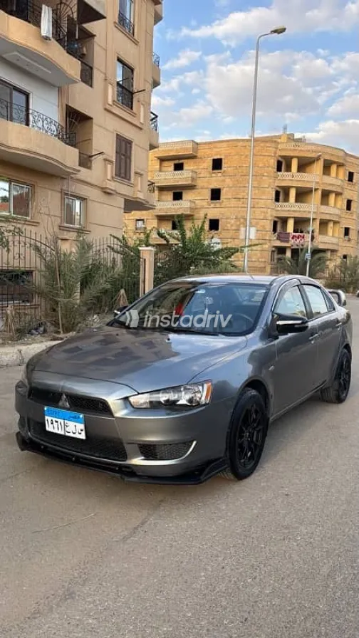 ميتسوبيشي لانسر 2016 رمادي مستعملة للبيع - 1