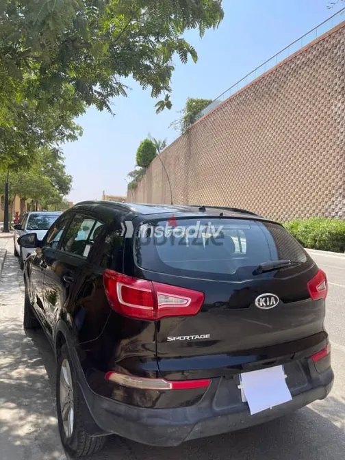 كيا سبورتاج 2012 أسود مستعملة للبيع - 6