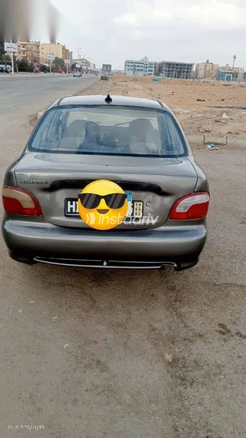 هيونداي اكسنت 1999 بني مستعملة للبيع - 2