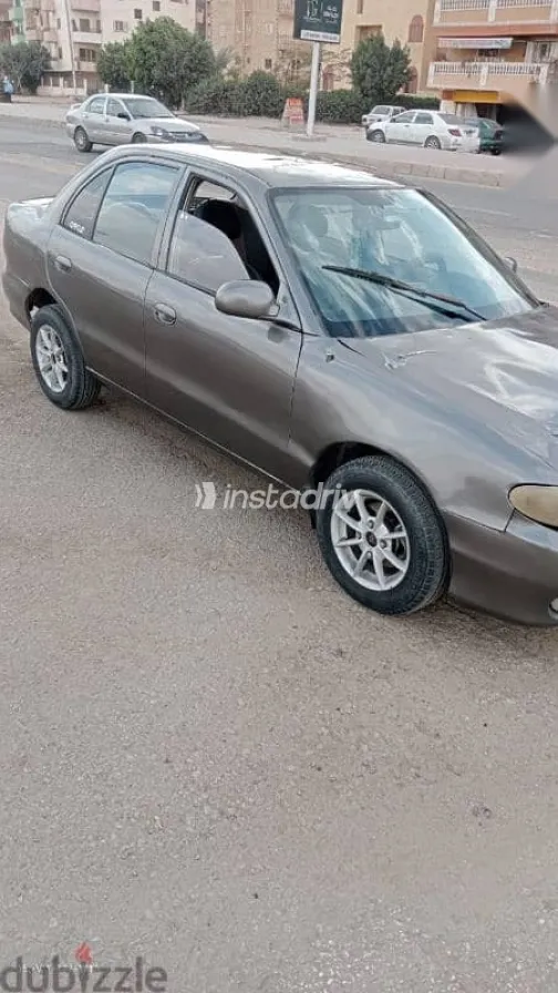 هيونداي اكسنت 1999 بني مستعملة للبيع - 4