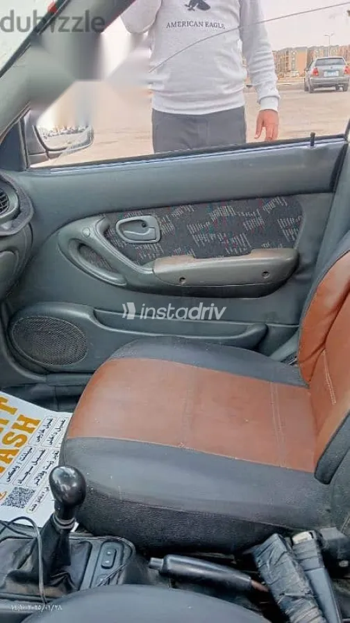 هيونداي اكسنت 1999 بني مستعملة للبيع - 7