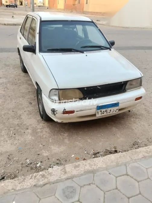 كيا برايد 2001 أبيض مستعملة للبيع - 2